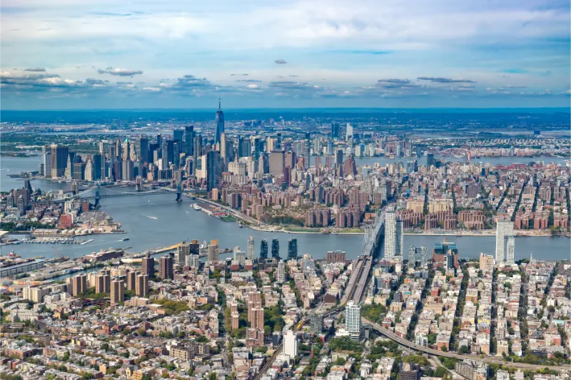 Expansive Aerial View New York City Showing East River With Brooklyn Manhattan Williamsburg Bridges