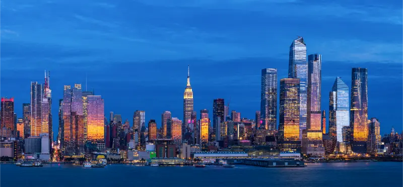 Midtown Manhattan Skyline At Night From The Hudson River